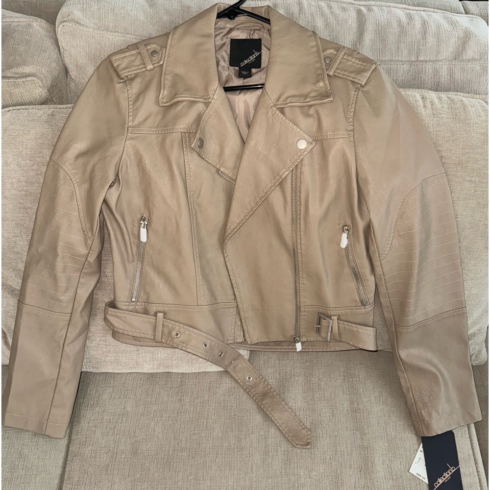 Light tan fake leather jacket. Brand new. Size medium. Colectionb New York